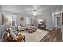 A welcoming living room with modern furniture, a ceiling fan, and plenty of natural light at 2704 Shaftsbury St, Durham, NC 27704
