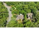 Beautiful home nestled among lush trees, offering privacy and a serene setting at 101 Cardiff Pl, Chapel Hill, NC 27516
