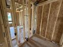 Bathroom framing with visible piping and stud walls allows customizable design at 29 Chloe Ct, Selma, NC 27576