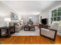 Cozy living room with neutral tones and natural light at 4909 Brookhaven Dr, Raleigh, NC 27612