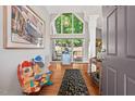 Bright foyer with hardwood floors, high ceilings, and backyard views at 104 Cedar Ridge Way, Durham, NC 27705