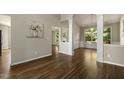 Bright living area features hardwood floors, neutral paint, and plenty of natural light throughout at 4619 Regency Dr, Durham, NC 27713