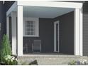 View of the home's quaint front porch with seating, framed by white columns, and brick stairs at 536 Folk Song Way, Wendell, NC 27591