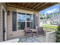 Relaxing porch with comfortable seating, a decorative rug, and views of the neighborhood at 5637 Garnet Meadow Rd, Knightdale, NC 27545