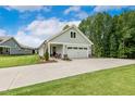 Stunning single-Gathering home boasts a well-manicured lawn, and a covered front porch at 8217 White Star Dr, Fuquay Varina, NC 27526