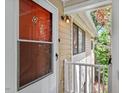 Welcoming front door and porch area of a charming home with stylish exterior lighting at 1009 Iredell St # D, Durham, NC 27705
