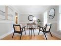 Bright home office space with stylish decor, modern furniture, and natural light at 304 Ramblewood Dr, Raleigh, NC 27609