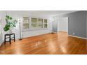 Inviting living room featuring hardwood floors, natural light, and a comfortable atmosphere at 5523 Newberry Dr, Raleigh, NC 27609