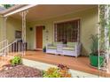 Inviting front porch featuring comfortable seating, creating a cozy outdoor living space at 1405 Pennsylvania Ave, Durham, NC 27705