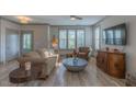 Cozy living room with neutral tones, hardwood floors, and stylish furnishings at 1624 Tunnel St, Wendell, NC 27591
