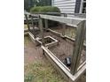 Empty fenced garden bed for growing herbs, fruits, or vegetables at 305 Lochridge Dr, Roxboro, NC 27573