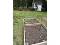 Garden beds ready for planting at 305 Lochridge Dr, Roxboro, NC 27573