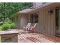 Cozy patio with chairs, perfect for relaxing outdoors and enjoying peaceful surroundings at 3833 Hidden Branches Dr, Raleigh, NC 27613