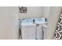 Convenient laundry room with modern washer and dryer units for easy laundry days at 4736 Walden Pond Dr, Raleigh, NC 27604
