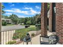 Inviting covered porch with a sitting area, offering a relaxing outdoor space at 5309 Overtop Ln, Raleigh, NC 27613