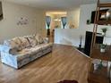 Inviting living room with fireplace and wood-look flooring at 110 Knightwood Dr, Durham, NC 27703