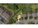 Aerial view of property showing lot lines, landscaping, and neighborhood at 1304 Barnford Mill Rd, Wake Forest, NC 27587