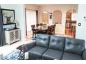 Inviting living space seamlessly connects to the dining area and kitchen, perfect for gatherings at 8600 Colville Ct, Raleigh, NC 27617