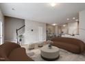 Sun-filled living room featuring modern decor, stylish furniture, and a neutral color palette at 107 Tuftin Dr, Durham, NC 27703