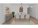 Elegant dining room showcasing contemporary furniture, sleek flooring, and tasteful wall accents at 2621 Asher View Ct, Raleigh, NC 27606