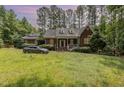 Charming brick home with manicured landscaping, offering a welcoming curb appeal at 3304 Black Stallion Ct, Zebulon, NC 27597