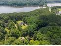 Lush aerial view of a lakeside community at 6001 Waters Way Dr, Raleigh, NC 27606