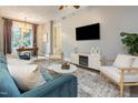 Cozy living room with modern decor, stylish furniture, and a large window at 618 N Boylan Ave # 520, Raleigh, NC 27603