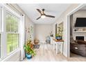Well-lit living room features luxury vinyl flooring and a neutral color scheme at 2809 Titleist Dr, Hillsborough, NC 27278