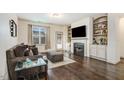 Comfortable living area showcasing a fireplace and built-in shelving for storage at 51 Balboa Pkwy, Clayton, NC 27520