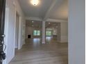 Bright and airy living room with hardwood floors, fireplace and plenty of natural light at 511 Sweet Potato Lane # 10, Nashville, NC 27856