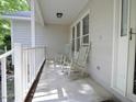 Cozy front porch with rocking chairs, perfect for relaxing outdoors at 637 Shadywood Ln, Raleigh, NC 27603