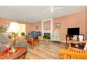 Cozy living room featuring a fireplace and ample seating for entertaining at 713 Saint Catherines Dr, Wake Forest, NC 27587