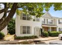 Inviting home featuring tidy landscaping, a sunny front facade and lovely tree cover at 8151 Rhiannon Rd, Raleigh, NC 27613