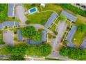 An aerial view shows the community layout, including a pool, parking, and green spaces at 1002 Willow Drive # 63, Chapel Hill, NC 27514