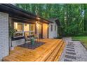 Inviting front porch with stylish seating, providing a welcoming entrance to the home at 301 Lord Berkley Rd, Raleigh, NC 27610