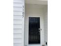 A close up exterior view of the front door with the house numbers 3105 to the left at 3105 White Blossom Ct, Raleigh, NC 27610