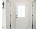 Elegant front door with decorative glass insert at 4179 Dunkirk Dr, Burlington, NC 27215