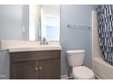 Well-lit bathroom with a vanity and a shower-tub combination at 418 Lodestone Dr, Durham, NC 27703