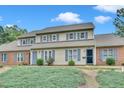 Attractive townhouses with blue shutters nestled in a tranquil, well-maintained neighborhood at 2602 Hitchcock Dr, Durham, NC 27705