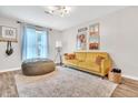 Cozy living room featuring a comfy sofa, stylish decor, and ample natural light at 2602 Hitchcock Dr, Durham, NC 27705