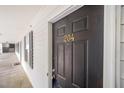 Close-up shot of front door with the unit number '204' in gold lettering at 1851 Trailwood Heights Ln # 204, Raleigh, NC 27603