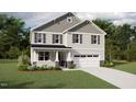 Charming two-story home with gray accents, a covered porch, and a two-car garage at 228 Sprenger St, Garner, NC 27529