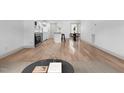 Open living space with hardwood floors and light walls, perfect for entertaining or relaxing with Gathering and friends at 502 S Eighth St, Mebane, NC 27302