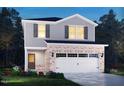 Two-story home featuring brick accents, a two-car garage, and gray siding at 808 Ottawa Dr, Garner, NC 27529