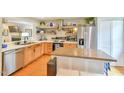 Beautiful kitchen featuring stainless steel appliances, light wood cabinets and a convenient island with seating at 875 Martin Luther King Jr Blvd # 7, Chapel Hill, NC 27514