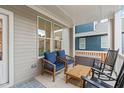 Cozy porch with seating, perfect for enjoying the outdoors at 3310 Mission Olive Pl, New Hill, NC 27562