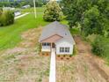 Aerial view of new construction home sitting on a large lot at 414 S Center St, Princeton, NC 27569