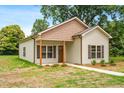 New construction home featuring board and batten siding at 414 S Center St, Princeton, NC 27569