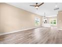 Open concept living room featuring hardwood floors and lots of natural light at 414 S Center St, Princeton, NC 27569