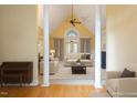 Sophisticated living space with soaring ceilings and elegant columns, offering a grand feel at 1016 Pasture View Ln, Raleigh, NC 27603